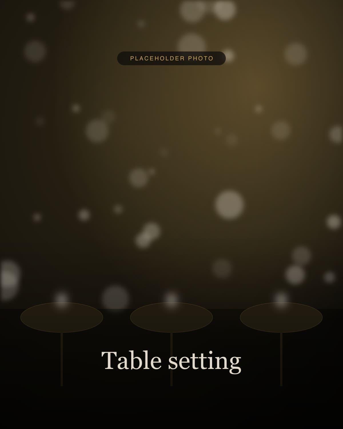 Table set with linen, brass cutlery and candles